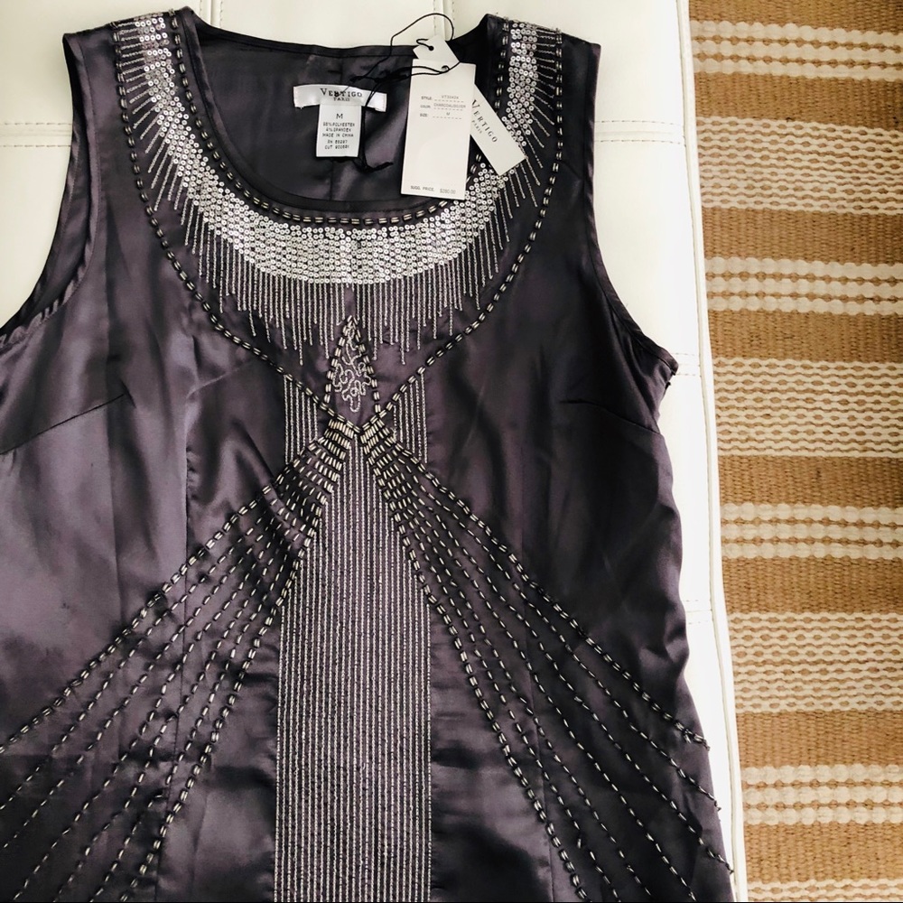 Stunning, sequined silver dress